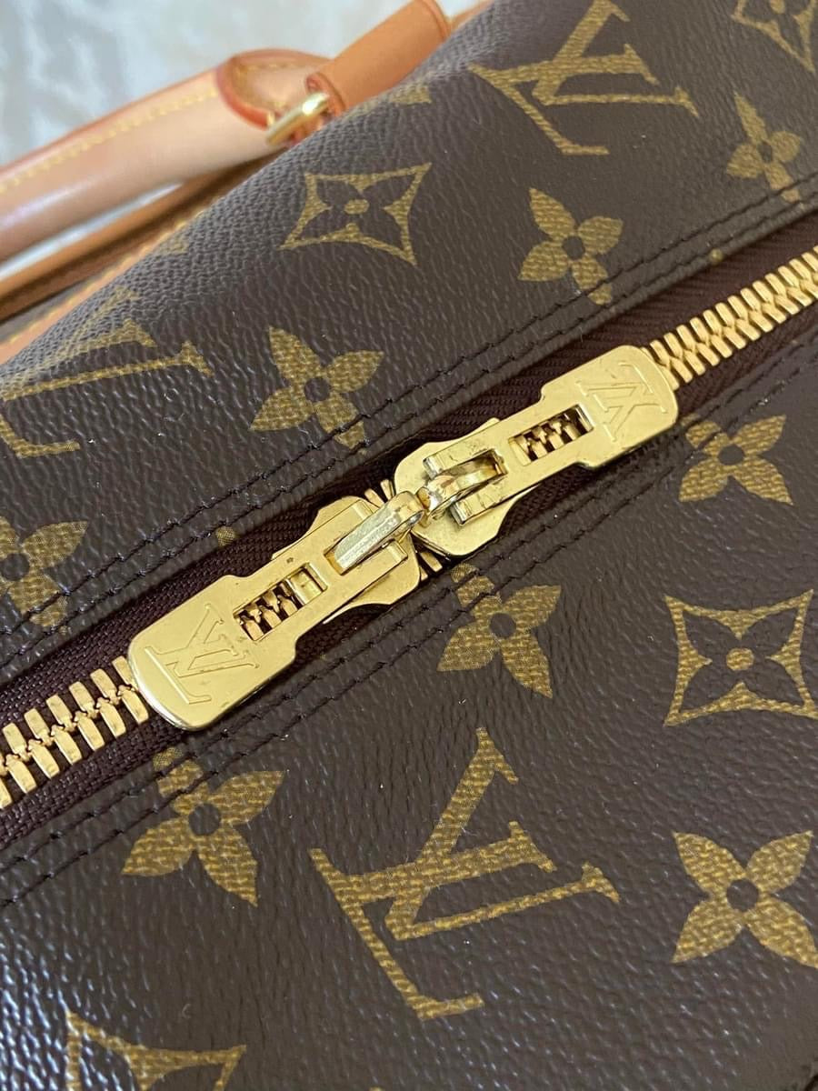 LV Eole 50 rolling luggage