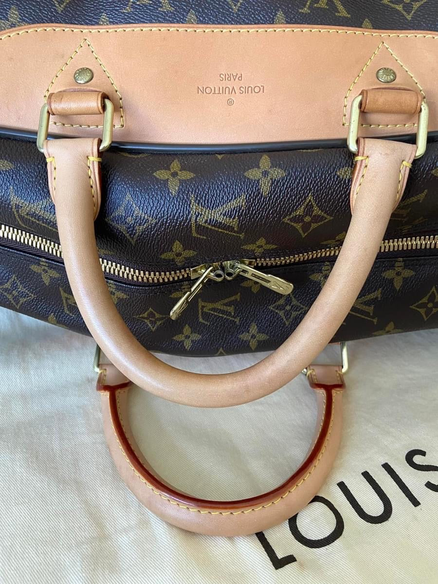 LV Eole 50 rolling luggage