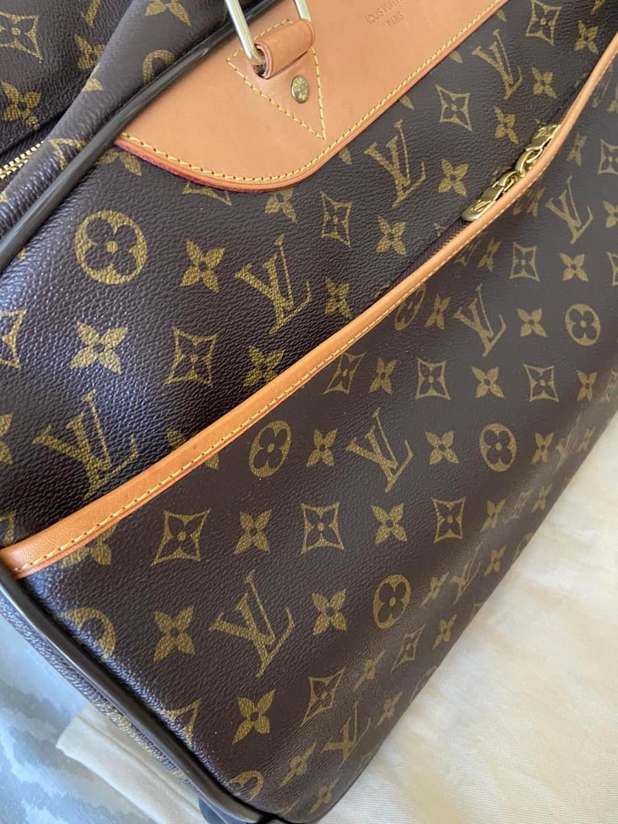 LV Eole 50 rolling luggage