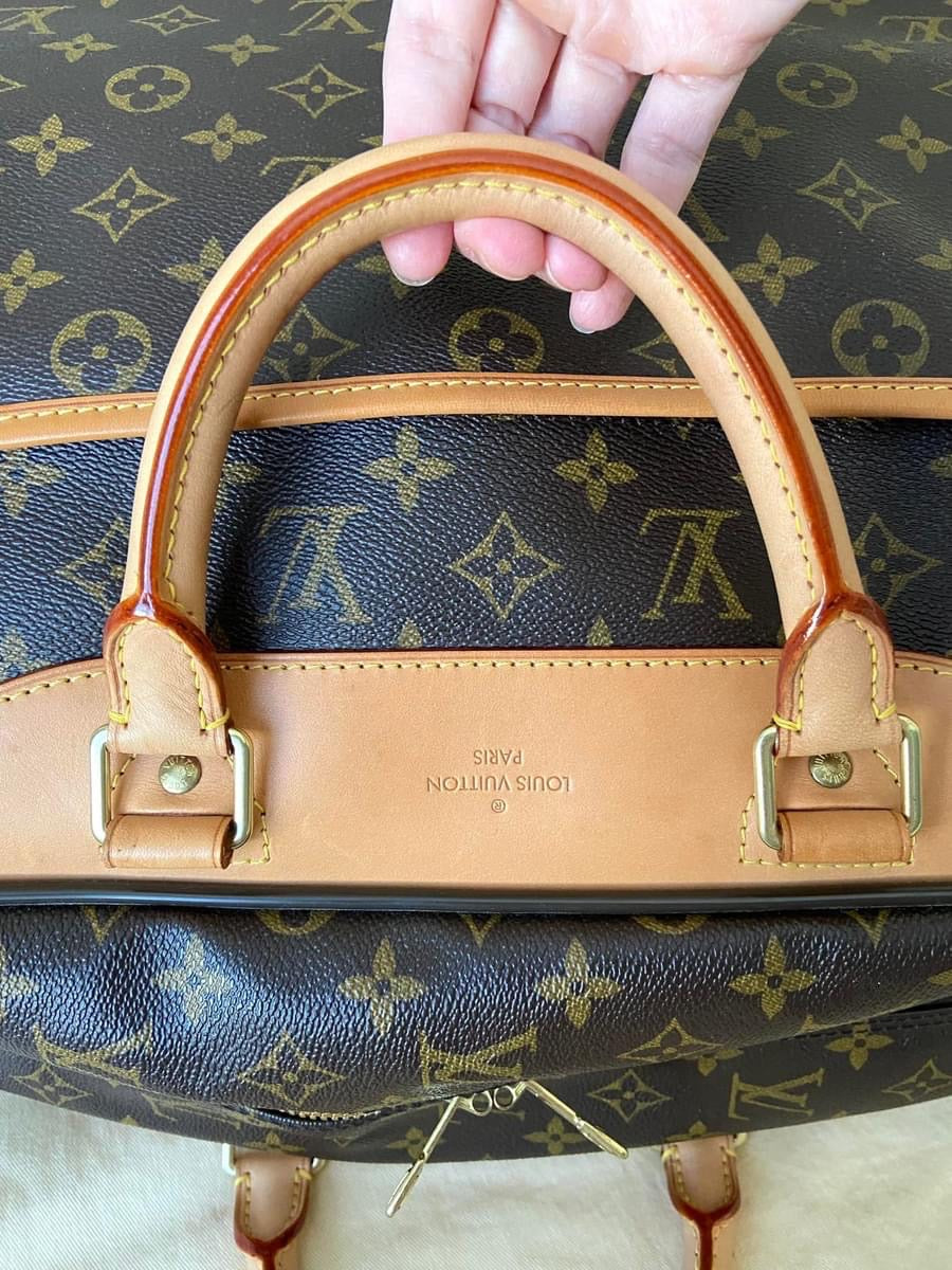 LV Eole 50 rolling luggage